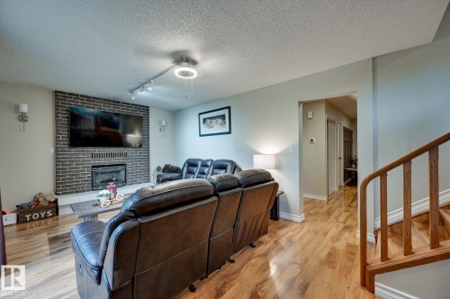 #100 22549 Twp Rd 510, Rural Leduc County, AB - Indoor With Fireplace