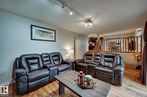 #100 22549 Twp Rd 510, Rural Leduc County, AB - Indoor Photo Showing Living Room