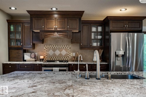 #100 22549 Twp Rd 510, Rural Leduc County, AB - Indoor Photo Showing Kitchen With Double Sink With Upgraded Kitchen