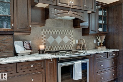 #100 22549 Twp Rd 510, Rural Leduc County, AB - Indoor Photo Showing Kitchen With Upgraded Kitchen