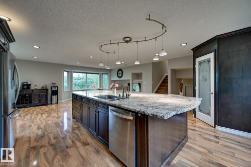 #100 22549 Twp Rd 510, Rural Leduc County, AB - Indoor Photo Showing Kitchen With Double Sink With Upgraded Kitchen