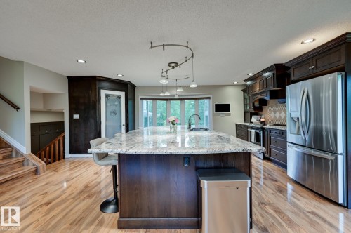#100 22549 Twp Rd 510, Rural Leduc County, AB - Indoor Photo Showing Kitchen With Upgraded Kitchen