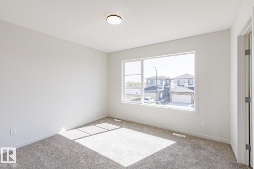 215 Wattle Road, Leduc, AB - Indoor Photo Showing Other Room