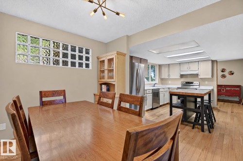 Wood-finish flooring throughout, with a neutral wall palette - 17919 78 Avenue Nw, Edmonton, AB 