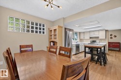 Wood-finish flooring throughout, with a neutral wall palette - 