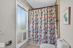 Shower stall with ceramic tile surround - 