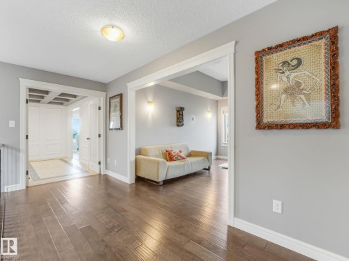 Upstairs, you’ll find a thoughtfully laid-out second floor. To the left is the private entrance to the spacious master suite, a generous bonus room lies straight ahead, and two additional bedrooms are located to the right. - 3711 Westcliff Way Sw, Edmonton, AB 