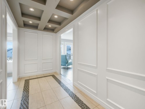 The entrance to the primary bedroom suite feels like it belongs in a multi-million-dollar estate - a private wing offering unparalleled luxury and seclusion. - 3711 Westcliff Way Sw, Edmonton, AB 