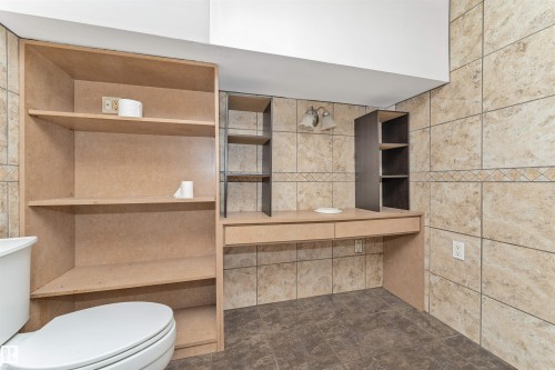 Ceramic tile walls with decorative accent band - 11208 163A Avenue Nw, Edmonton, AB 