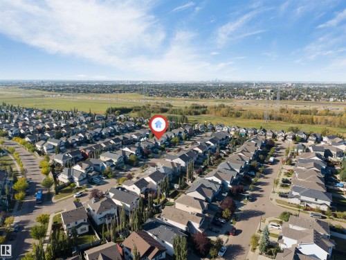 Residential neighborhood with established streets and varied home designs - 136 55 Street Sw, Edmonton, AB 