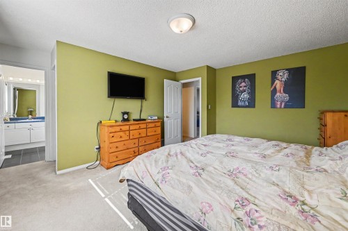 Carpeted flooring throughout the room - 8513 156 Avenue Nw, Edmonton, AB 