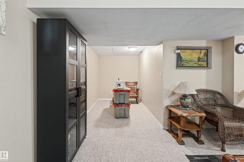 Recessed lighting, light-colored carpeting, and painted walls - 8513 156 Avenue Nw, Edmonton, AB 