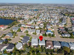 Expansive neighborhood with a large body of water - 
