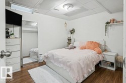 Wood-finish flooring with white walls - 