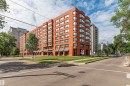 Multi-story building featuring a brick exterior and multiple windows - #815 10160 114 St Nw, Edmonton, AB 
