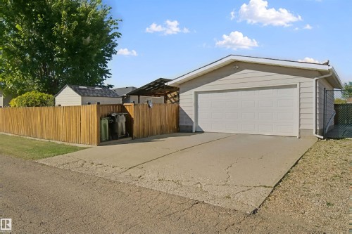 Oversized double heated garage & parking pad - 11439 144 Avenue Nw, Edmonton, AB 
