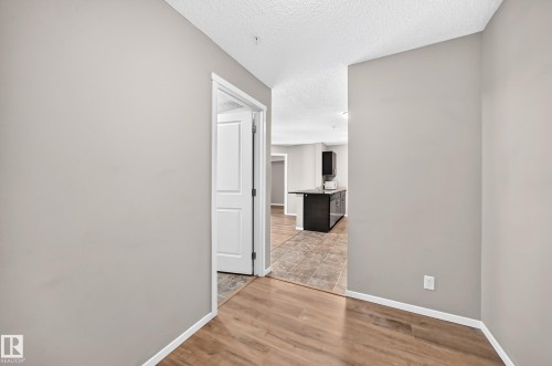#219 5816 Mullen Pl Nw, Edmonton, AB - Indoor Photo Showing Other Room