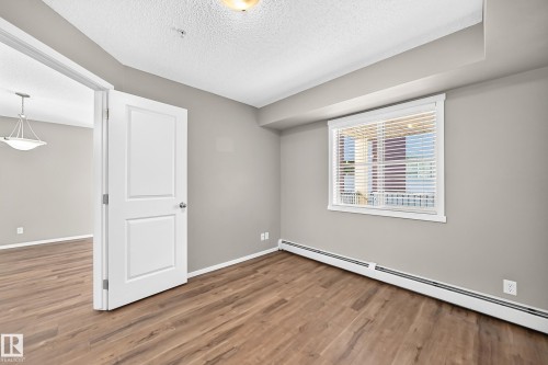 #219 5816 Mullen Pl Nw, Edmonton, AB - Indoor Photo Showing Other Room