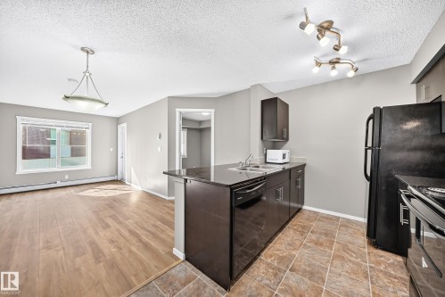 #219 5816 Mullen Pl Nw, Edmonton, AB - Indoor Photo Showing Kitchen