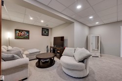 Recessed lighting, drop ceiling, and neutral wall paint - 