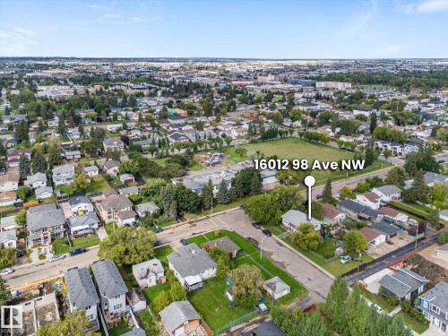 Residential neighborhood setting with established trees and surrounding green spaces - 16012 98 Avenue Nw, Edmonton, AB 