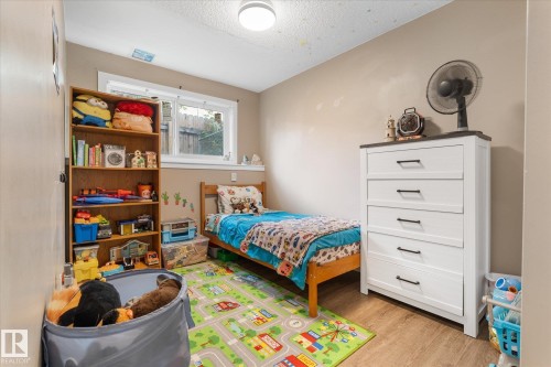 Hard-surface flooring, window, and ceiling-mounted light fixture - 16012 98 Avenue Nw, Edmonton, AB 
