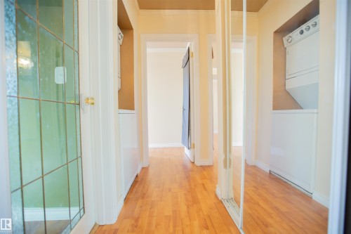 Hardwood-style flooring throughout - 13032 120 Street Nw, Edmonton, AB 