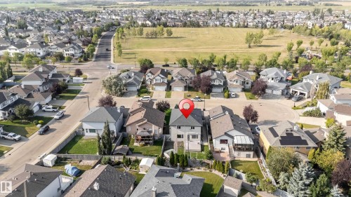 Suburban residential area featuring a cul-de-sac and a large open field - 10621 175A Avenue Nw, Edmonton, AB 