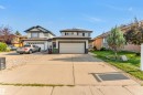 Exterior featuring a two-story design with a concrete driveway and an attached two-car garage - 10621 175A Avenue Nw, Edmonton, AB 