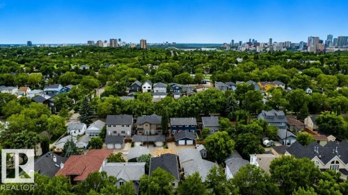 Established residential area featuring mature tree canopies and varied home styles - 9216 91 Street Nw, Edmonton, AB - Outdoor With View