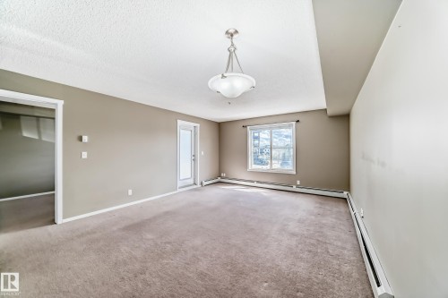 #210 3315 James Mowatt Tr Sw Sw, Edmonton, AB - Indoor Photo Showing Other Room