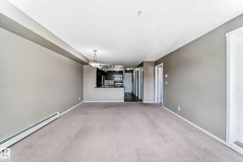 #210 3315 James Mowatt Tr Sw Sw, Edmonton, AB - Indoor Photo Showing Other Room