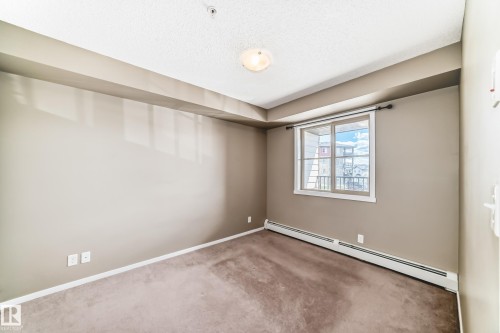 #210 3315 James Mowatt Tr Sw Sw, Edmonton, AB - Indoor Photo Showing Other Room