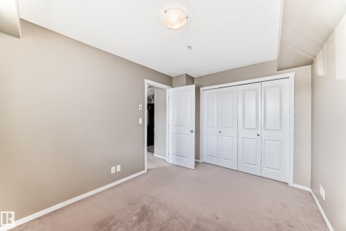 #210 3315 James Mowatt Tr Sw Sw, Edmonton, AB - Indoor Photo Showing Other Room