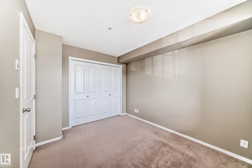 #210 3315 James Mowatt Tr Sw Sw, Edmonton, AB - Indoor Photo Showing Other Room