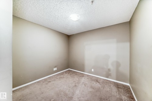 #210 3315 James Mowatt Tr Sw Sw, Edmonton, AB - Indoor Photo Showing Other Room