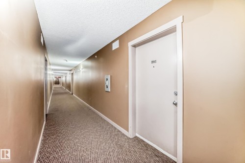 #210 3315 James Mowatt Tr Sw Sw, Edmonton, AB - Indoor Photo Showing Other Room