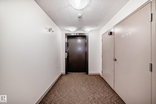 #210 3315 James Mowatt Tr Sw Sw, Edmonton, AB - Indoor Photo Showing Other Room