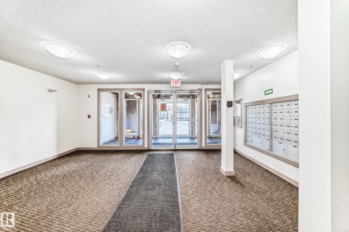 #210 3315 James Mowatt Tr Sw Sw, Edmonton, AB - Indoor Photo Showing Other Room