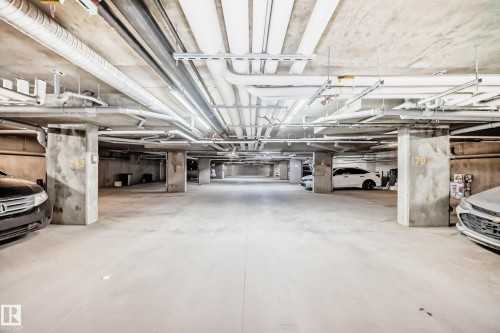#210 3315 James Mowatt Tr Sw Sw, Edmonton, AB - Indoor Photo Showing Garage