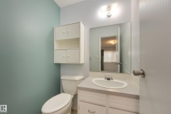 White vanity with an integrated sink and laminate countertop - 