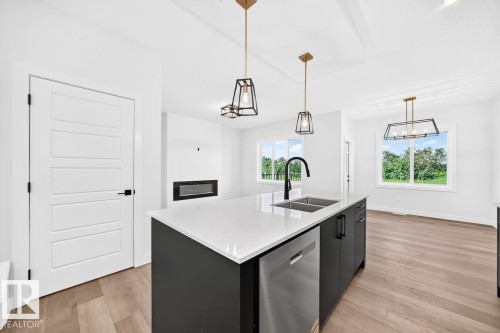 106 Waverly Way, Fort Saskatchewan, AB - Indoor Photo Showing Kitchen With Double Sink With Upgraded Kitchen