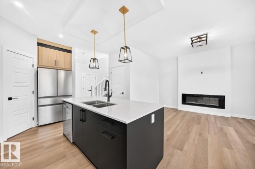 106 Waverly Way, Fort Saskatchewan, AB - Indoor Photo Showing Kitchen With Double Sink With Upgraded Kitchen