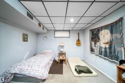 Recessed lighting and a drop ceiling - 4808 106 Avenue Nw, Edmonton, AB 