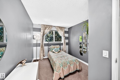 Window with curtains - 5620 93A Avenue Nw, Edmonton, AB 