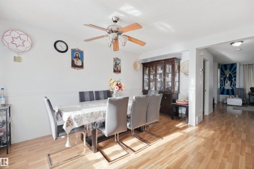 Recessed lighting, wood-finish flooring, and a ceiling fan with integrated lighting - 15911 38 Street Nw, Edmonton, AB 