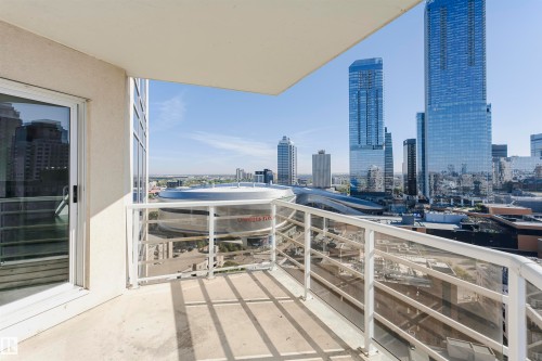 Balcony with concrete flooring and a clear glass railing system - #1902 10388 105 St Nw, Edmonton, AB 