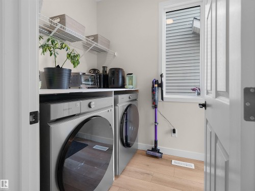 209 Desrochers Boulevard Sw, Edmonton, AB - Indoor Photo Showing Laundry Room