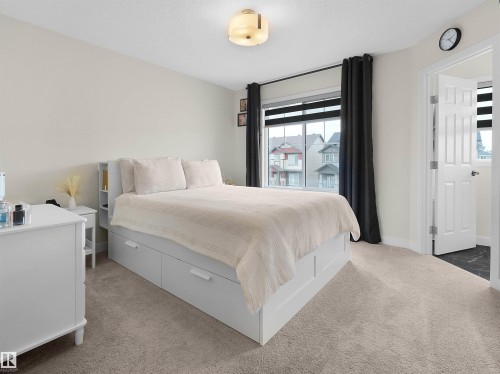 209 Desrochers Boulevard Sw, Edmonton, AB - Indoor Photo Showing Bedroom