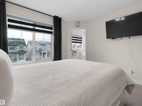 209 Desrochers Boulevard Sw, Edmonton, AB - Indoor Photo Showing Bedroom